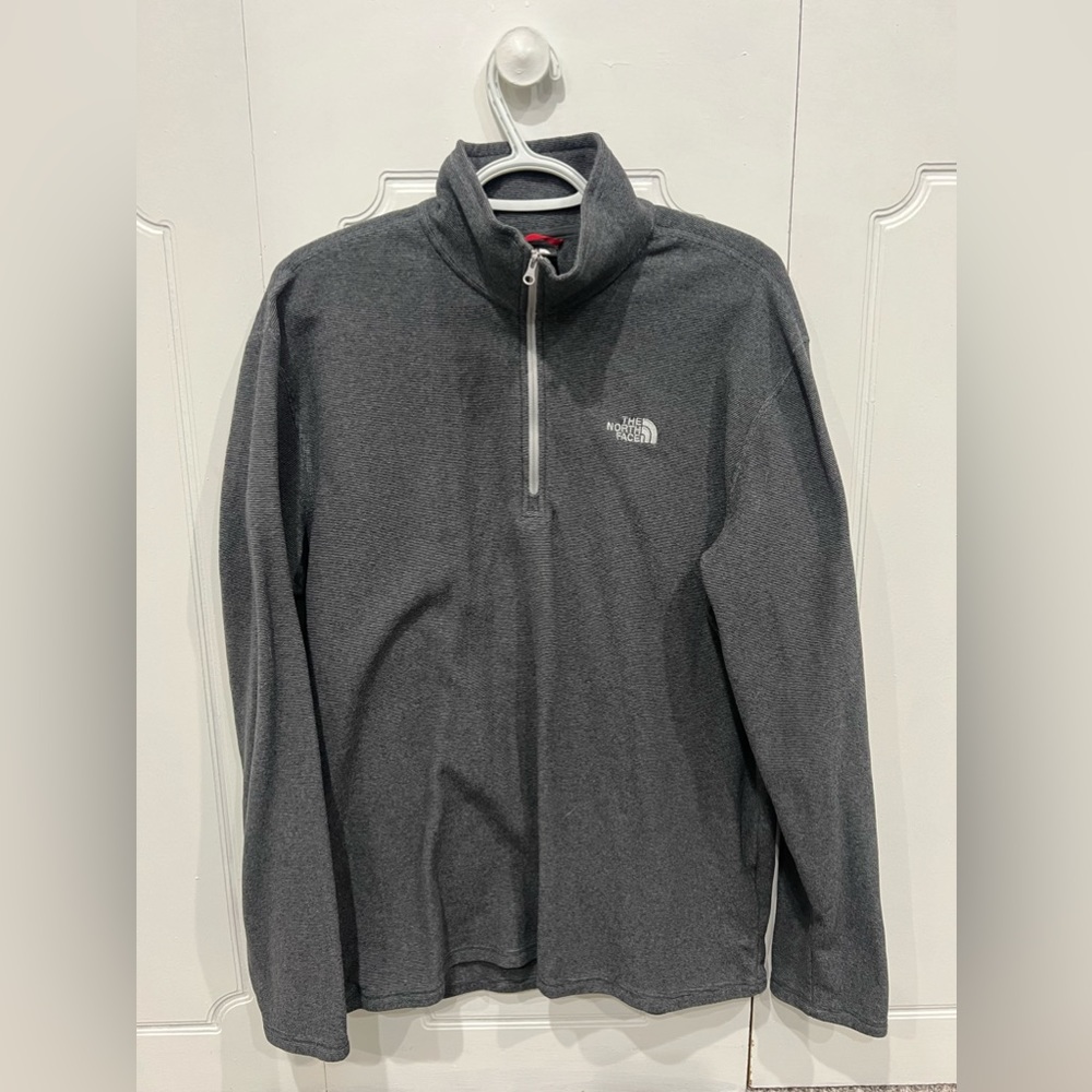North Face 1/4 zip. Gray in color. Hardly used.